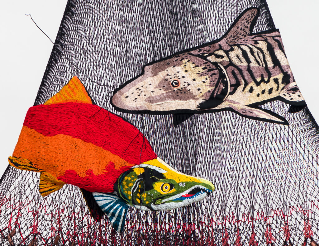 artwork with fishing nets and fish