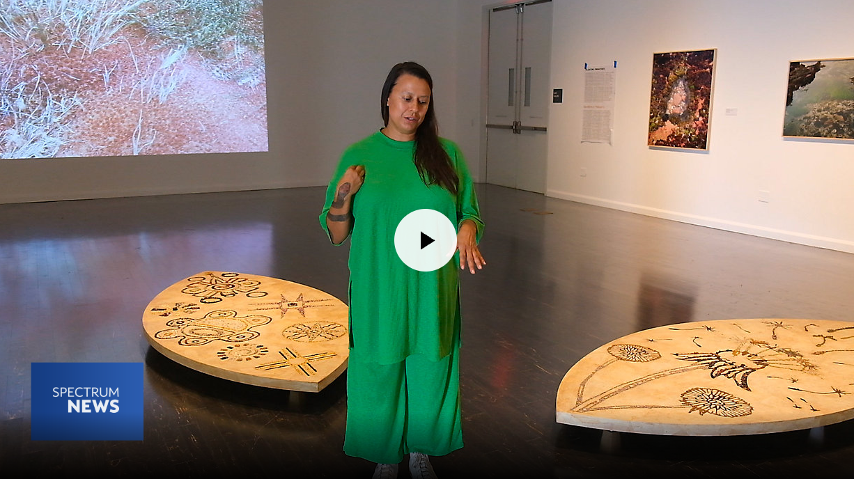 a screenshot of a video featuring artist Carolina Caycedo in her exhibition